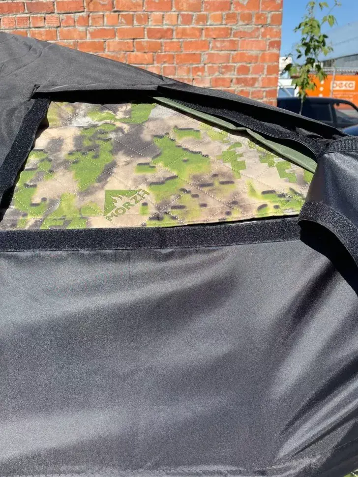 inord sadesuoja luukku auki.webp